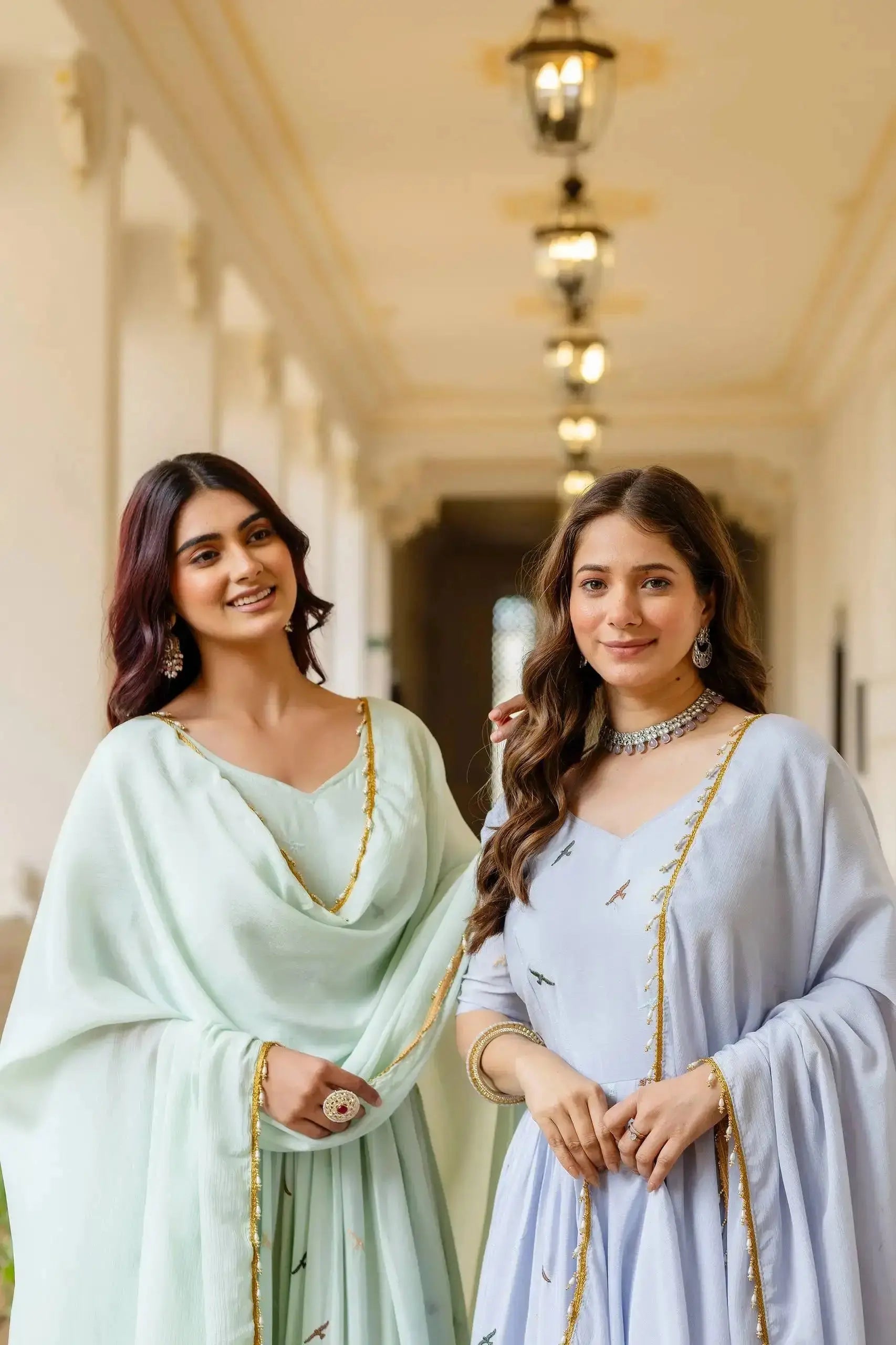 Close-up portrait of Anarkali Suit models – Pastel Green and Blue | Kalyanja